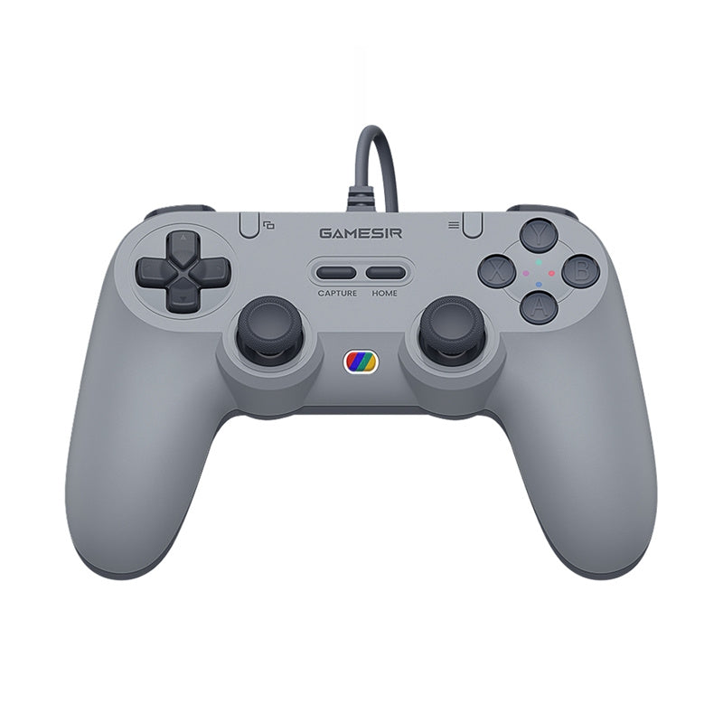 Manette filaire gris rétro vue de face, câble sortant par le haut, croix directionnelle à gauche et deux sticks au centre