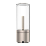 Yeelight Candela - Lampe d'ambiance rechargeable 1800 K : lumière chaude à 1800 K sur une table