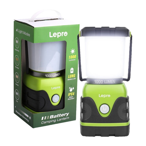 Lepro 3300002 - Lampe de camping à piles 1000 lm, 360° : lampe de camping allumée sur une table