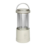 Lepro 330043 - Lampe de camping 1100 lumens, 5 modes, IPX4 : lampe de camping Lepro 330043 allumée sur une table en bois